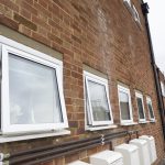Commercial white open windows installed by First Windows