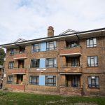 Cedar House Commercial black windows installed by First Windows full view of flats