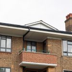 Commercial black windows and doors installed by First Windows on top floor