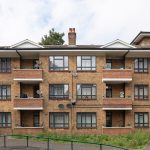 Cedar House back view of Commercial black windows installed by First Windows full view of flats