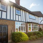 Frist Windows installed on traditional Residential building 2 story house