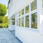 White uPVC windows and doors installed by First Windows side view
