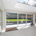 White uPVC windows installed by First Windows inside view with bike