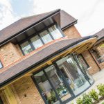 sliding doors installed on modern 3 story house
