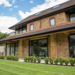 First Windows Patio doors installed on modern 3 story house