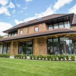 Patio doors and windows on modern 3 story house