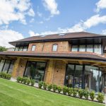 Patio sliding doors installed on modern 3 story house